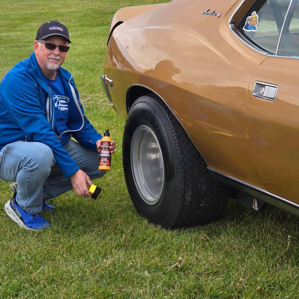 Mike Sadler and Tire Sheen next to a tan vintage car